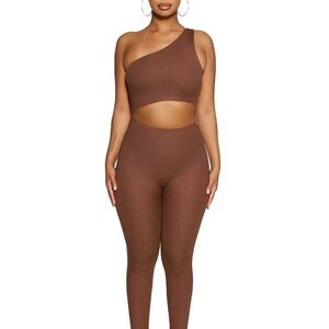 THE NW RIBBED ONE-SHOULDER CUTOUT JUMPSUIT IN CHOCOLATE
